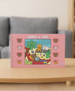 Livro Comfy sobre mesa